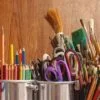 Jars full of artist brushes and pencils